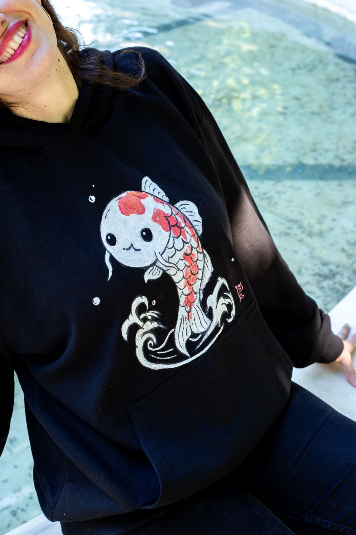 Light Black Sweatshirt with japanese inspired cute koi fish in the front.